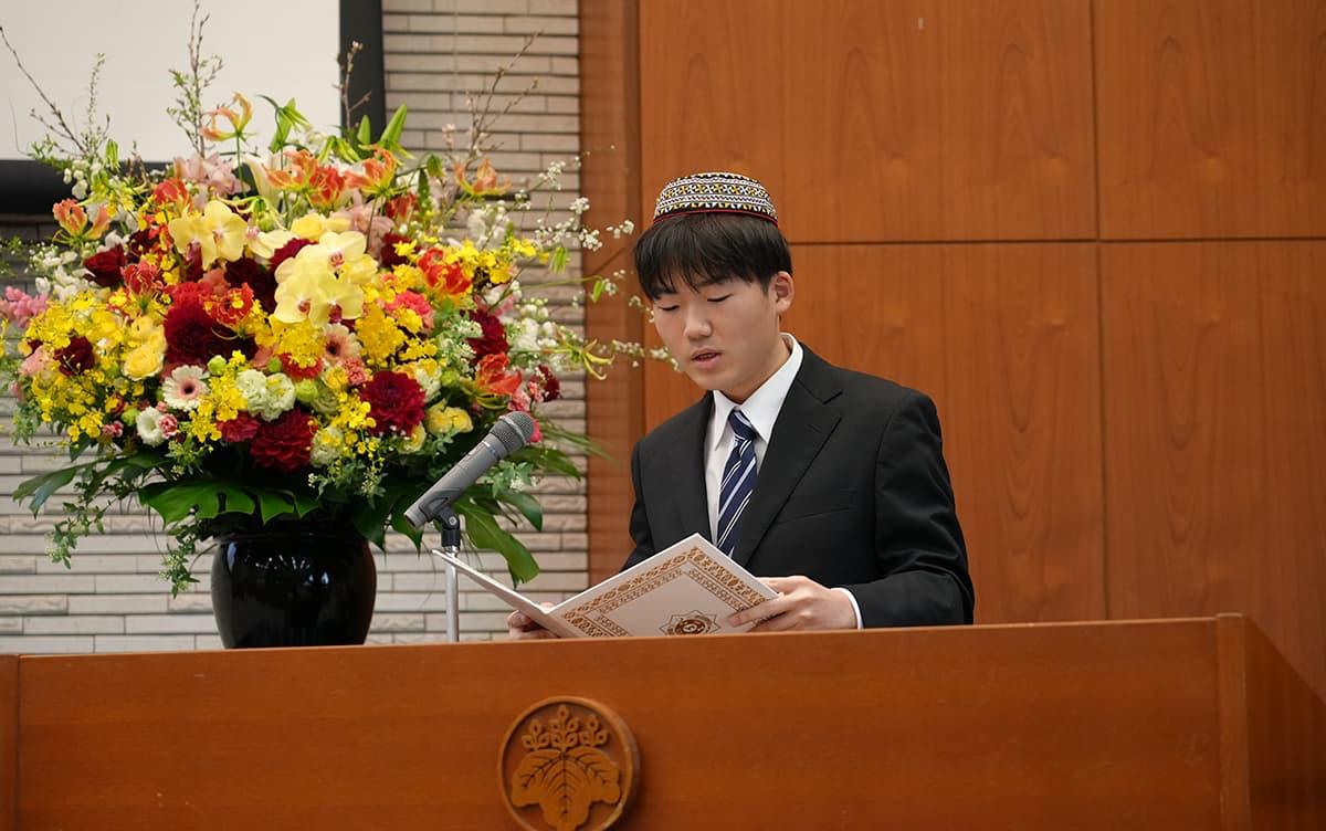 Student reciting a Turkmen poem at the ceremony